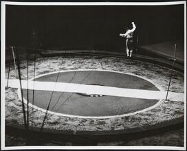 [High wire act at a circus.]