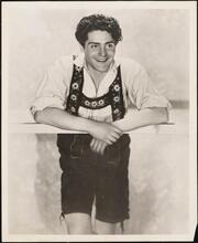 [Francis Lederer as The Gentleman in Gay Braces in "Autumn Crocus".]