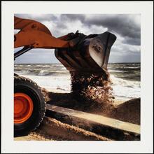 Removing sand off Compo Beach road and returning it to the beach