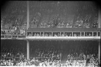 Football Writers [Fans in the stadium.]