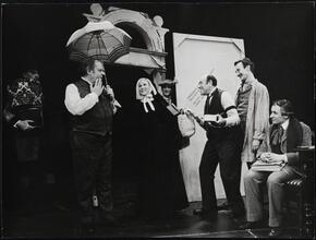 ["Break a Leg" theater still.]