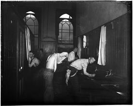 "Washing Up" in the Newsboys' lodging house.