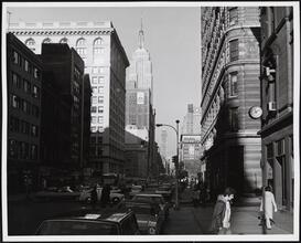 [Looking north on Fifth Avenue toward the Empire State Building.]