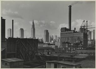 From foot of 32nd Street, East River, to Chrysler -- Barge in foreground
