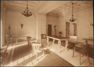 [Interior, possibly a reception room.]