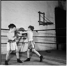 Boxing [at the] Police Athletic League [Two boys boxing.]