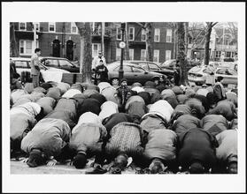 Men and boys at prayer time during Eid ul-Fitr at the end of Ramadan, Bay Ridge, Brooklyn