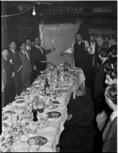 [Men at a feast.]