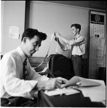 Teenage Radio Show [Teenagers in an office.]