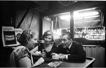 Peter Arno [Arno and a woman at a bar.]