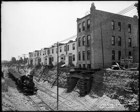 Sea Beach Line, 18th Avenue, with building support.