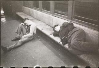 Life and Love on the New York City Subway [Men sleeping in a subway car.]