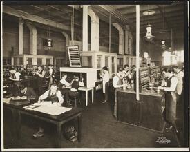 East 8th Street and Third Avenue. Cooper Union. Students at Cooper Union working in lab