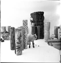 Salvador Dali: Rugs [Lamb in a display of rugs and materials that rugs contain.]
