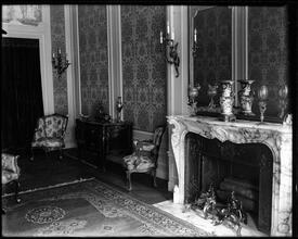 Harris Charles Fahnestock house. Room with fireplace.