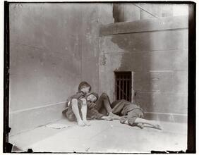 Street Arabs in sleeping quarters.
