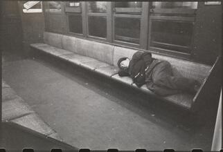 Life and Love on the New York City Subway [Man sleeping on a subway.]