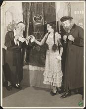 [Morris Strassberg, Lucy Levine and Irving Honigman in an unidentified production.]