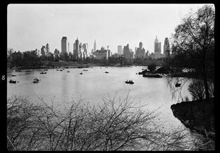 New York City views from Central Park. Across lake at 77th Street IV.