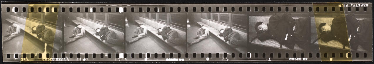 Life and Love on the New York City Subway [Men sleeping in a subway car.]