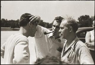 Walter Cartier, Prizefighter of Greenwich Village [Vincent Cartier and a man examining Walter Cartier's head.]