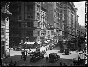 Broadway Series. View showing west side of Bway, looking north from 4th Street. Schulte Cigars and A. Dubois & Son signs are seen on corner at left.