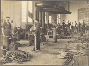 [Workers in a Brooklyn Rapid Transit machine shop.]