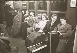 Life and Love on the New York City Subway [Musicians with their instruments on a subway.]