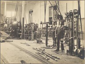 [Workers in a Brooklyn Rapid Transit machinery shop.]