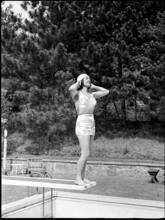 Billy Rose [Eleanor Holm on a diving board.]