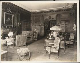 [Residence. Interior, parlor.]