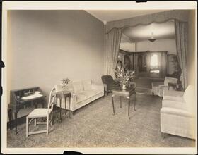 [Residence. Interior, sitting room.]