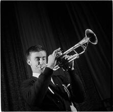 Swing Band Contest Sponsored by LOOK [Boy playing a trumpet.]