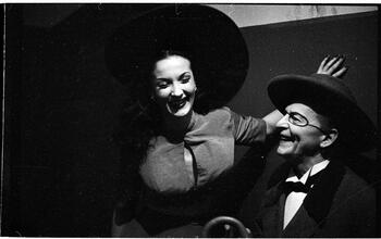 Show Girl [Rosemary talking to a man in costume.]