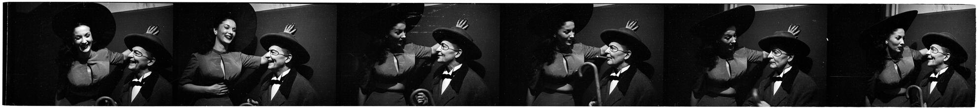 Show Girl [Rosemary talking to a man in costume.]