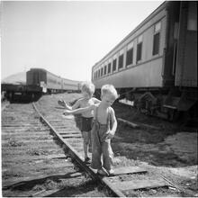Circus [Children playing on railroad tracks.]