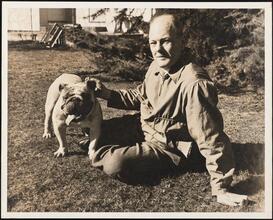 For 34 Years of Loyal Service - Eric S. Barron [Eric Barron with a dog.]
