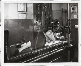 [Unidentified Woman in an X-Ray Machine.]