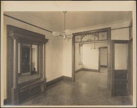 [Interior, view through empty rooms.]