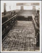 [Church. Interior, aisle towards rear.]
