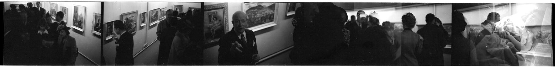 [Social gathering at art gallery.]