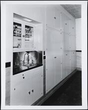 [Hospital. Interior, lab at sink.]
