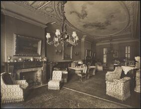 [Residence. Interior, parlor.]