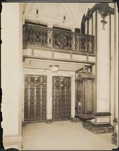 [Interior, elevator lobby.]