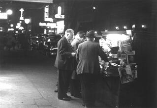 Untitled [Men at Newsstand, nighttime (duplicate)]
