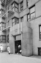 [Entrance to 860 Grand Concourse apartment complex.]