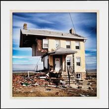 A beachfront home lies in tatters, Staten Island