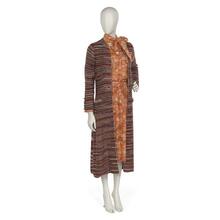 Dinner ensemble comprising wool coat and matching silk blouse and skirt
