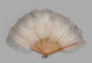 Folding feathered fan of gray and white ostrich chick feathers