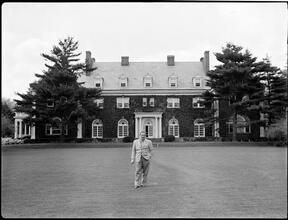 Billy Rose [Billy Rose in front of his house.]